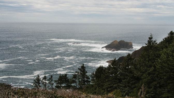 A view of the ocean from a hill